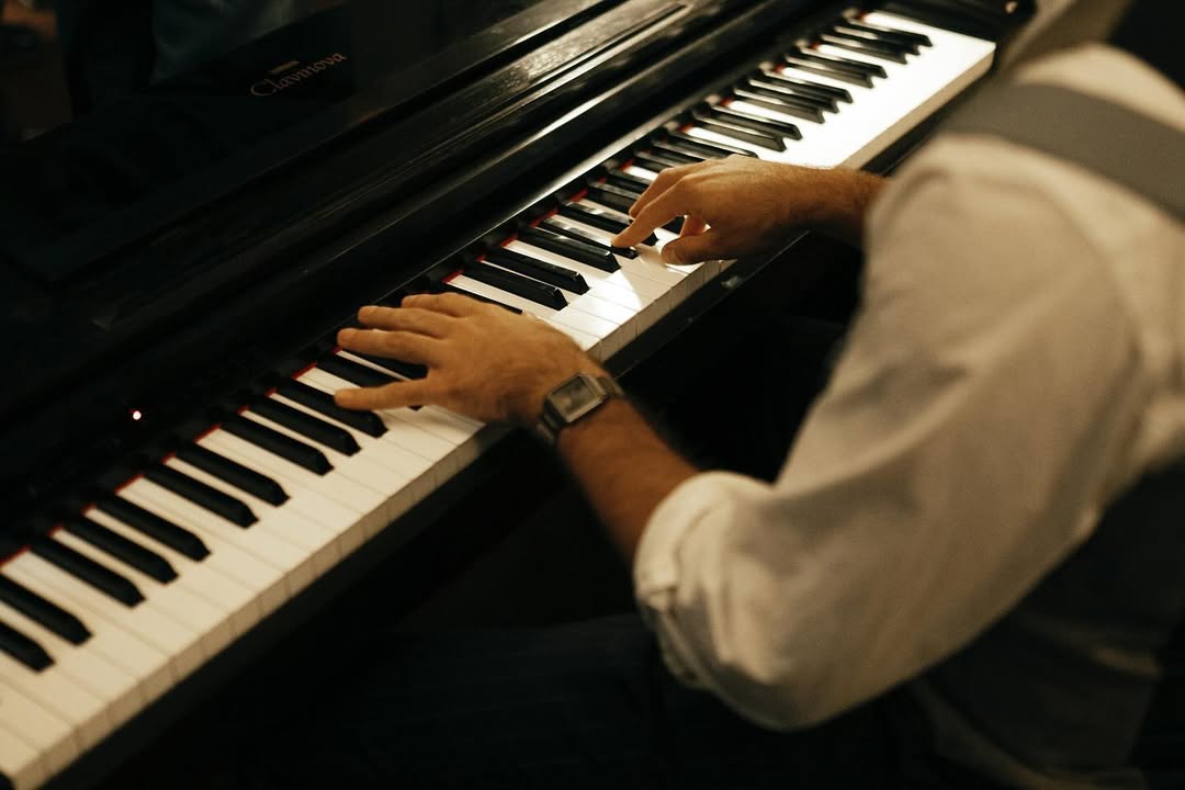 Pianist performing during the live show