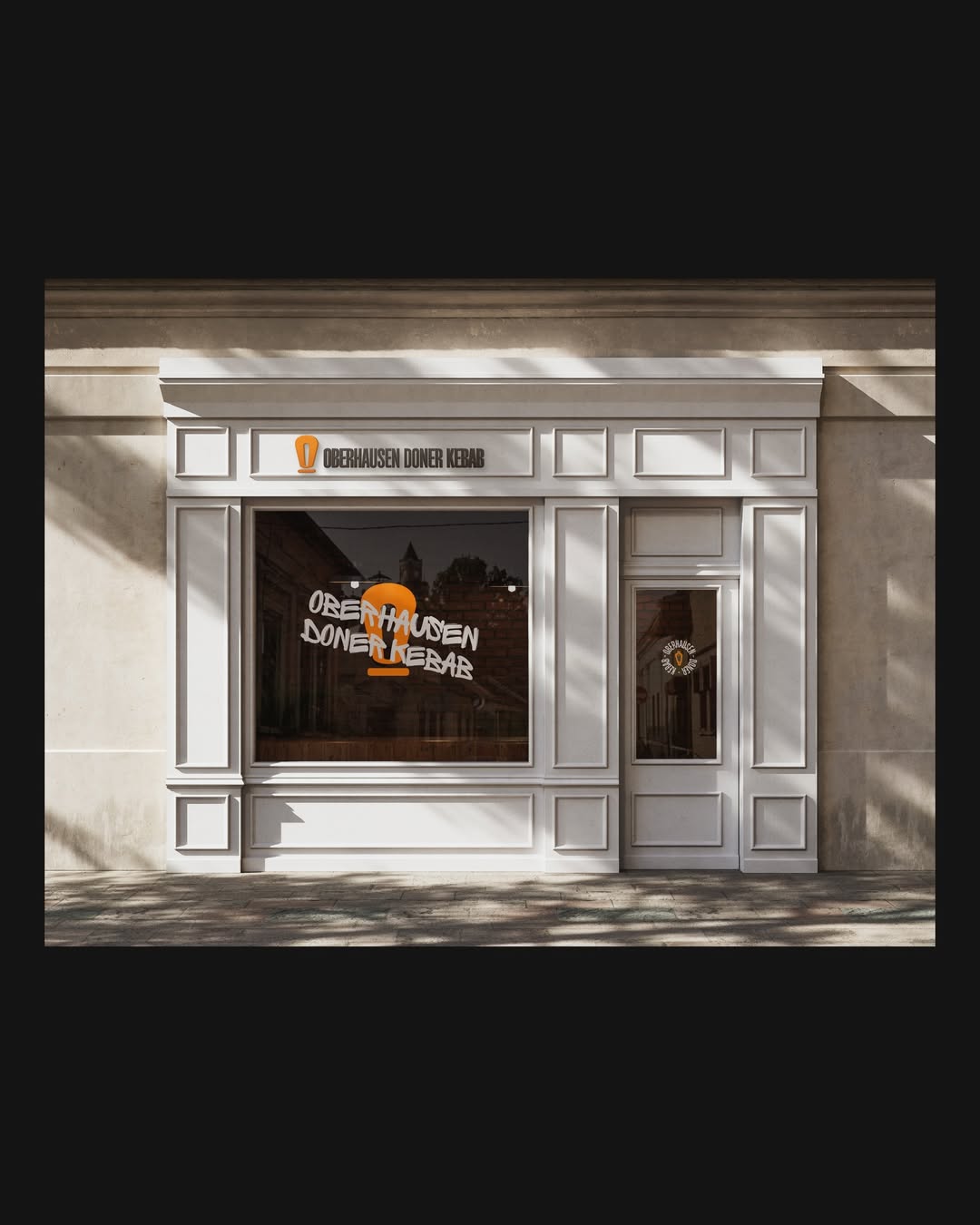 Storefront facade with brand graphics