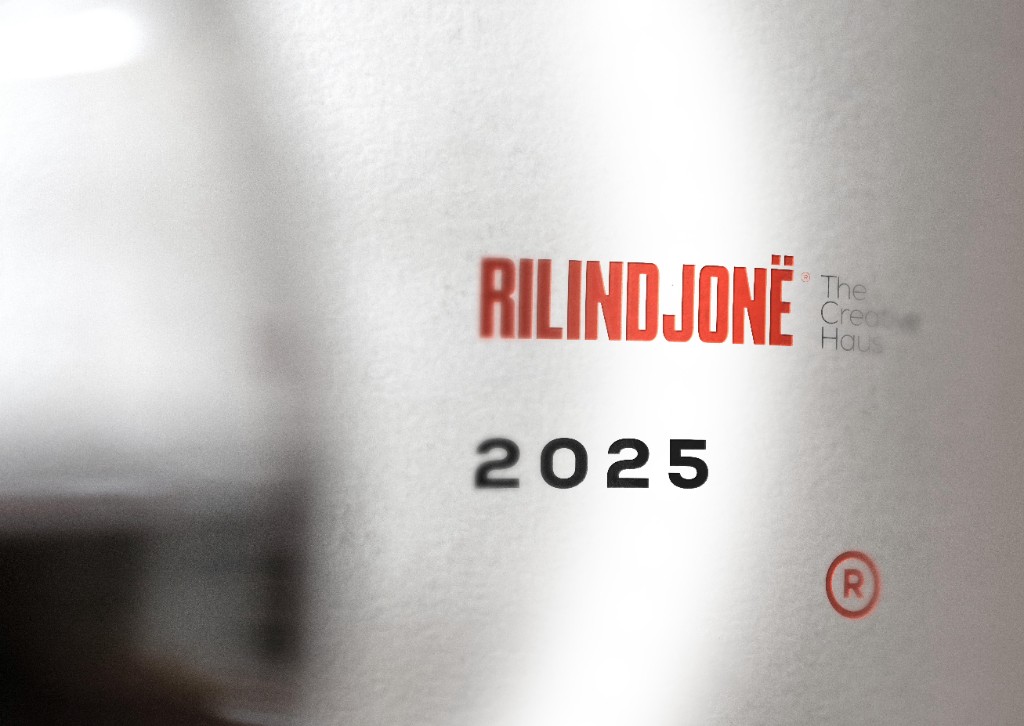 Business card and red envelope — Bold Strategies Timeless Impact, rilindjoneagency.com